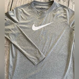 NIKE long sleeve dri-fit tee. Youth size XL. Light gray, white Nike swoosh logo